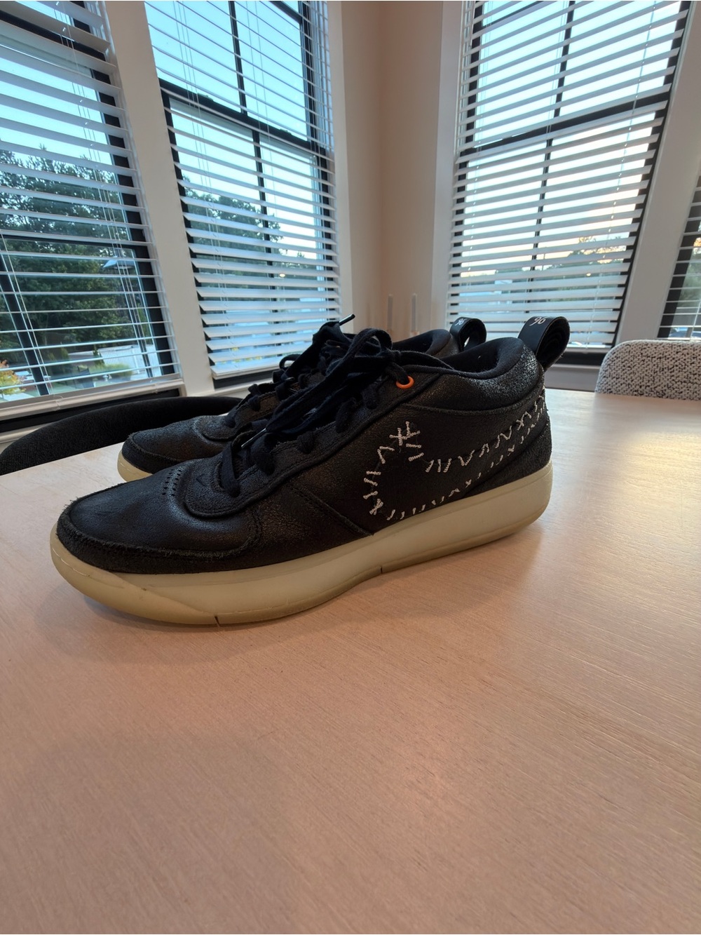 Nike Booker Black Sneakers with White Stitch Swoosh and Glow in the dark Sole